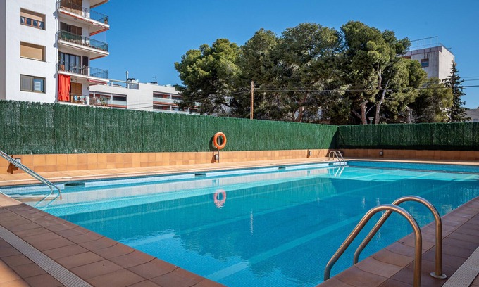Torredembarra Apartamento | Apartamento en Torredembarra: A 150m de la playa, 2 hab., terraza, piscina y Wi-Fi