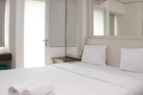 Karawang Apartamento | Cozy and Warm Studio at Grand Sentraland Karawang Apartment By Travelio