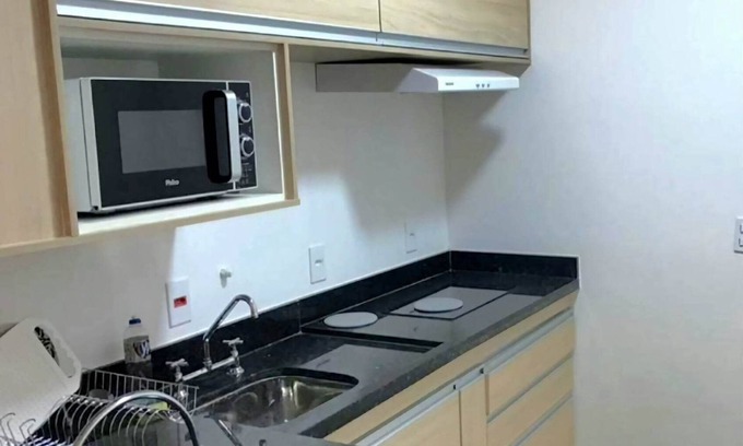 Alphaville Apartamento | Cozy apartment with double bed.