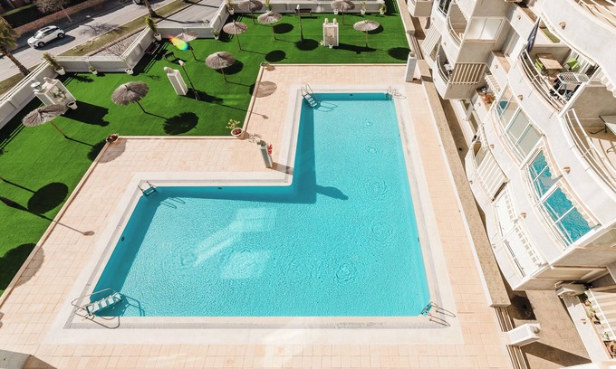 Cabo de las Huertas Apartamento | Apartamento acogedor con piscina y balcón, en la mejor zona de Alicante