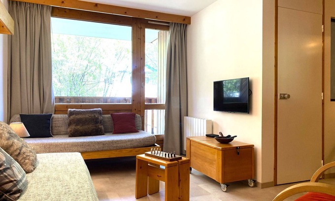 Val-d'Isere Apartamento | Acogedor apartamento con balcón, vistas a la montaña y parking cubierto en Val-d'Isère