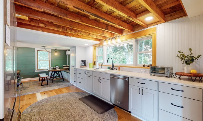 Waterville Casa | Cozy cabin w/mountain view, brook, dog-friendly, firepit, deck, wifi, TVs, BBQ
