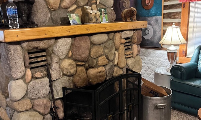 Kalkaska Cabina | Cozy cabin with wood burning fireplace. Ride in/out the snowmobile/ORV trails