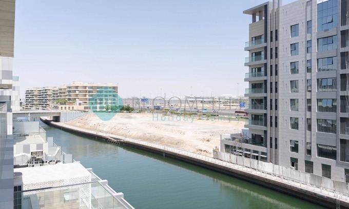 Al Raha Beach Apartamento | Cozy Canal View Apartment - 206