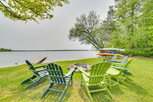 Carp Lake Casa | Cozy Carp Lake Cottage with Dock, Kayaks and Fire Pit