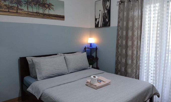 Mactan Export Processing Zone Apartamento | Cozy condo unit 5mins from Mactan Cebu Int'l Airport with Netflix