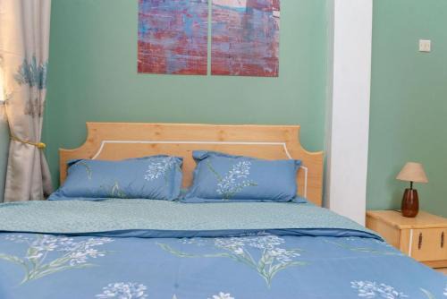 Kampala Apartamento | COZY COOL ,WIFI 6 MINS WALK TO ACACIA MALL