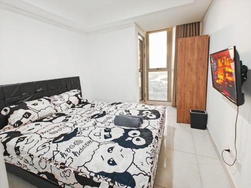 Pantai Indah Kapuk Apartamento | Cozy Gold Coast 1BR PIK Apt with Pool & Gym by 2ndHome
