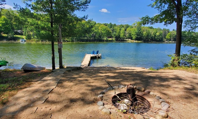 Kalkaska Cabina | Cozy lake front cabin on 6 private acres