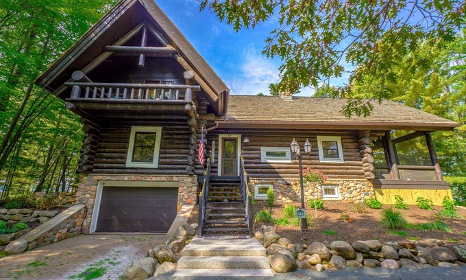 Spooner Cabina | Cozy Lake front luxury, hot tub, ice fish, snowmobile, fireplace, screened porch