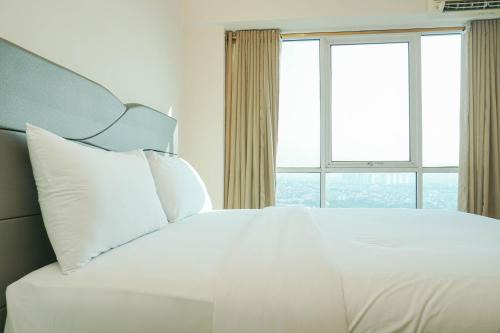 Kayu Putih Apartamento | Cozy Living 1BR at Tifolia Apartment By Travelio