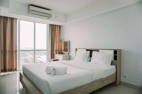 Cawang Apartamento | Cozy Living Studio Room Apartment at H Residence By Travelio