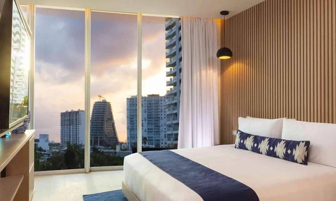 Centro de Cancún Hotel | Cozy Ocean Escape: Ultimate Seaside Relaxation | Sunset at the Pool