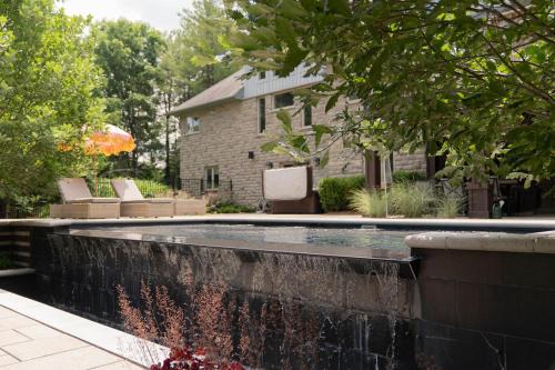 Elora Apartamento | Cozy Private Suite with Year-Round Hot Tub