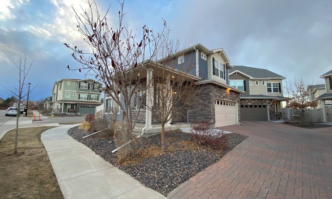 Dupont Casa | Cozy Two-Story Cottage House in Thornton with Secured Garage Parking.