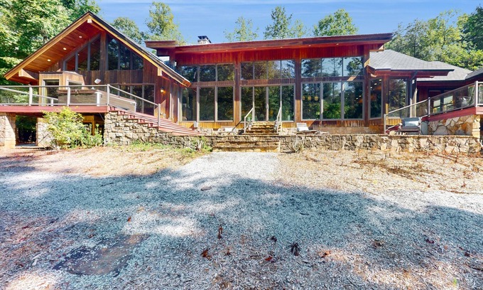 Dahlonega Cabina | Custom riverfront retreat with private pond, dock, firepit & outdoor living