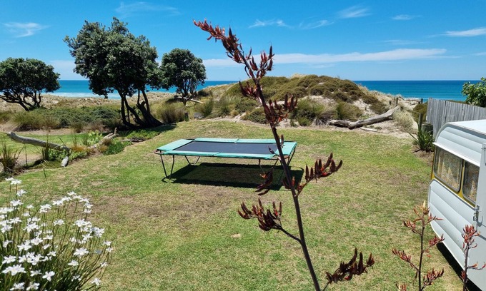 Mount Maunganui Cabaña | Linda casa de campo en la playa frente al monte