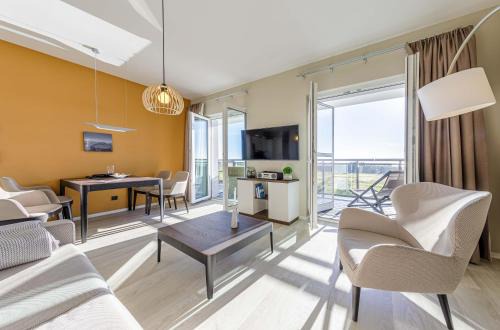 Ostseebad Wustrow Apartamento | Dünenlounge - 5 Sterne Ferienwohnung mit West-Balkon und fantastischem Blick über den Deich
