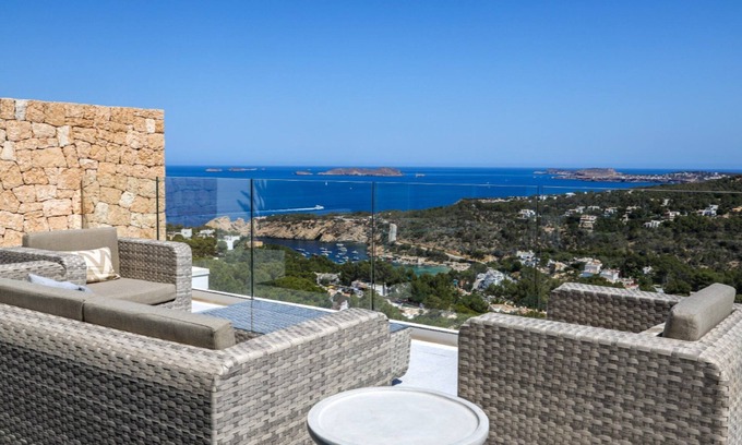 Cala Vadella Villa | Delightful Ibiza Apartment | Apartment Henry | 4 Bedrooms | Panoramic Sea Views | Private Jetted Tub & Shared Pool | Cala Vadella