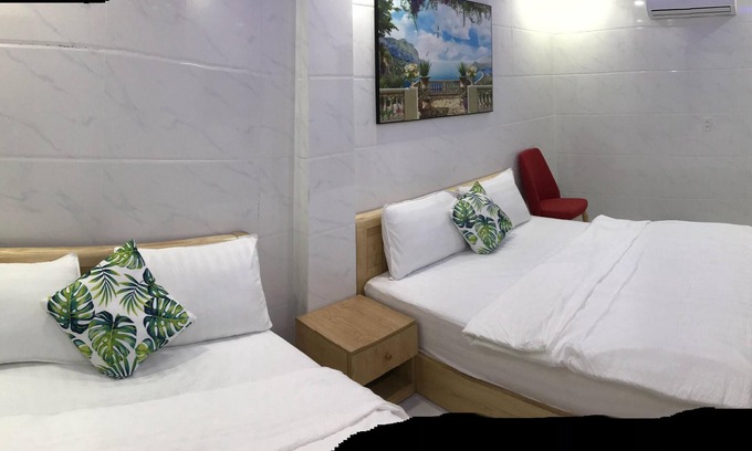 Ben Thanh Hotel | Deluxe privado 2 camas 1 baño 4 huéspedes en el hotel tu y yo