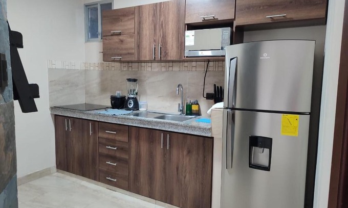 Simón Bolívar Apartamento | Departamento amoblado frente al aeropuerto