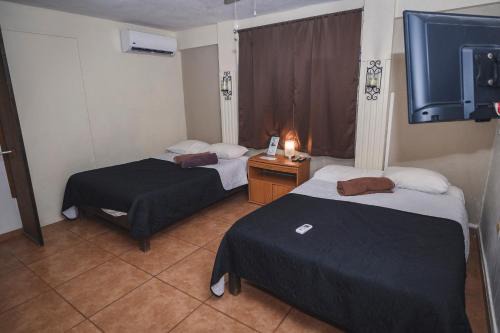 Zona Centro Apartamento | Departamento CENTRICO, Tv smart, minisplit nuevo, wifi 100 mb, cocina, lavadora, asador, parking, letra i