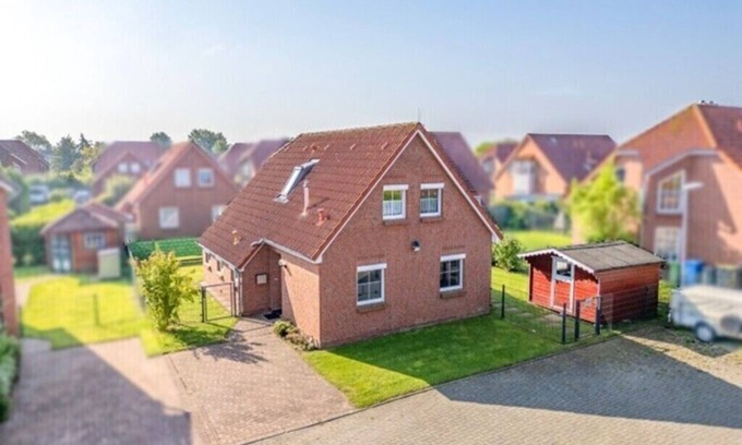 Neßmersiel Casa | Detached vacation home in Nessmersiel (near Deich) with private garden & wallbox