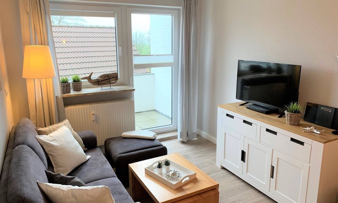 Busumer Deichhausen Apartamento | Directly on the North Sea (200 m). Free beach chair on the dike (May - Sept.).