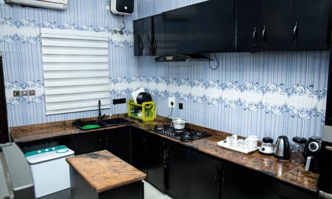 Lagos Mainland Apartamento | Discover Biens by Forji's luxurious 4-bedroom apartment in Chevron!