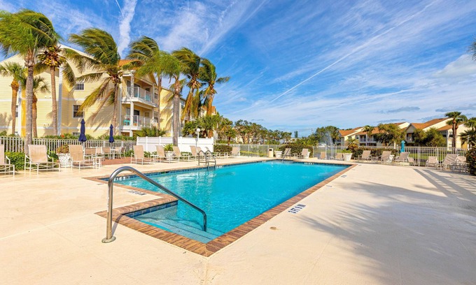 Ocean Side Village Condominio | Dog-friendly condo near the beach with outdoor pool, hot tub, gym, balcony, W/D