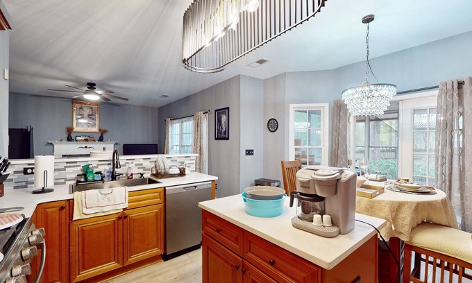 Lawrenceville Casa | Dog-friendly home with pool access plus a sunroom, washer/dryer, & AC