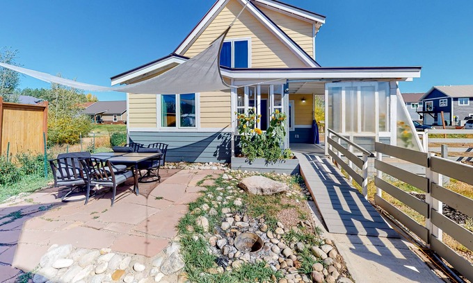 Gunnison Casa | Dog-friendly home with prime location, lovely patio, sun porch & WiFi