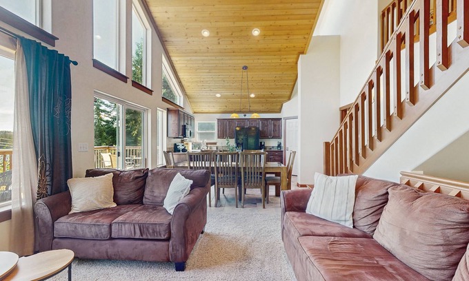 Coeur d'Alene Casa | Dog-friendly home with water views, deck, grill, wood stove, & private W/D