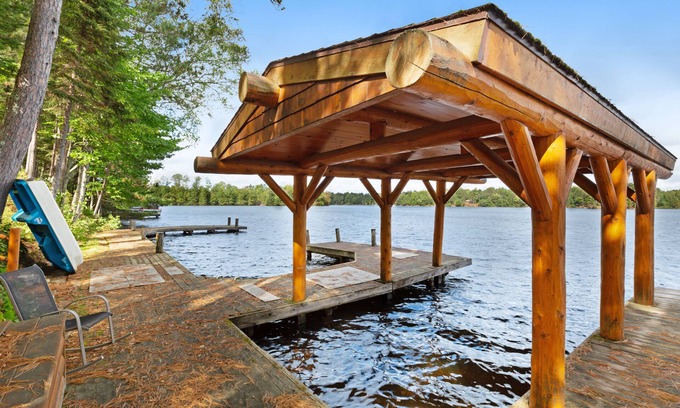 Manitowish Waters Casa | Dog-Friendly, Lakefront Home w/ Private Dock, Firepit, Sauna, & Free WiFi