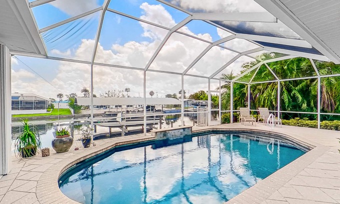 Matlacha Isles Casa | Dog-friendly waterfront home with heated pool, lanai, central AC, & W/D