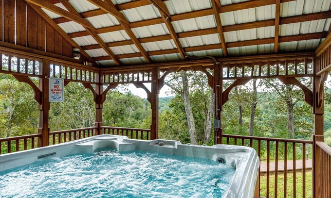 Marshall Cabina | Doolittle mountain cabin with hot tub, firepit & river views | near Asheville