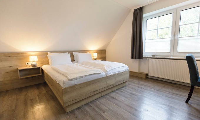 Dorumer Neufeld Apartamento | Double room 116. With garden view and dog-friendly.
