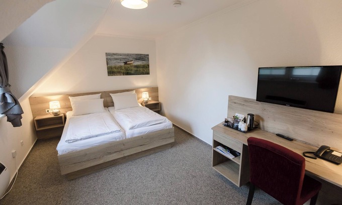 Dorumer Neufeld Apartamento | Double room 118. Cozy and for two.