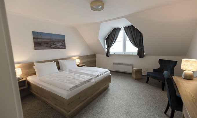 Dorumer Neufeld Apartamento | Double room 119. Quiet and close to the beach.