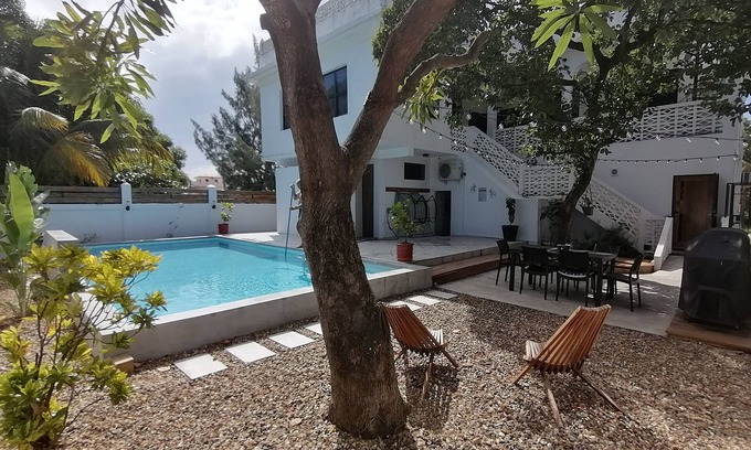 Dangriga Casa | Downtown Dangriga. Entire property. Private pool. Sleeps 20. Handicap Accessible