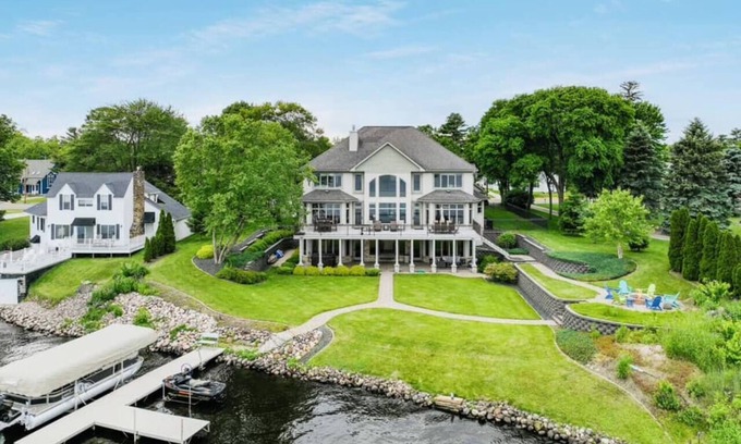 Chetek Casa | Downtown Lakefront Home on Lake Chetek w/hot tub & pontoon & jet ski rental