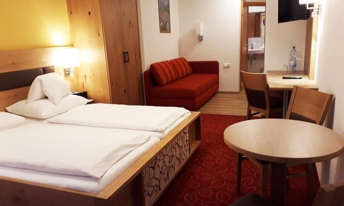 Fusch an der Grossglocknerstrasse Apartamento | DR Edificio principal / 1 cama supletoria / HB - Ponyhof, Feriendorf-Hotel-Pension