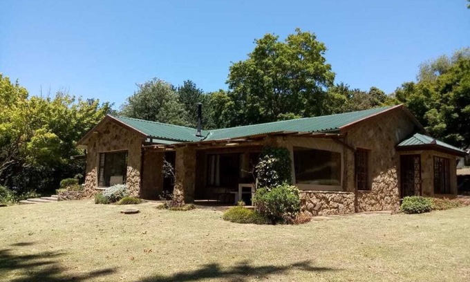 Cathkin Park Cabaña | Drakensberg House - Champagne Valley Capacidad para 1-8 personas.
