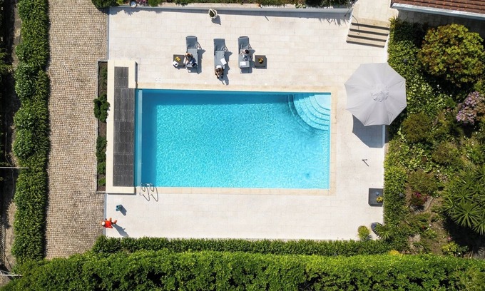 Paredes Casa | Dual Villas, Pool and Gym Retreat by HostWise