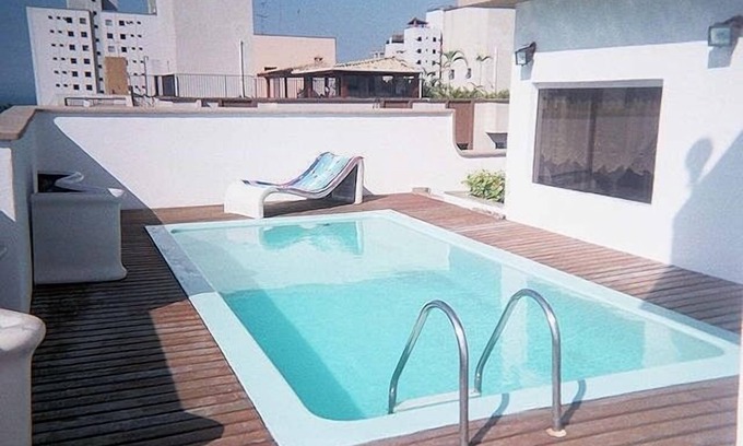 Parque Enseada Apartamento | Duplex penthouse * pool / barbecue on the beach - 1 suite