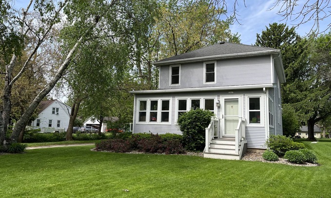 Oshkosh Casa | EAA rental near airport w/firepit, backyard, peekaboo lake view, and a clear sky