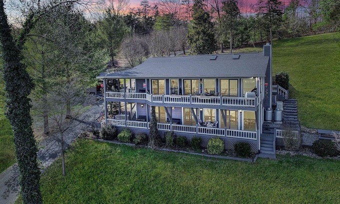 La Follette Casa | East Norris Point Breathtaking Lake View with Private Dock in Year Around Water