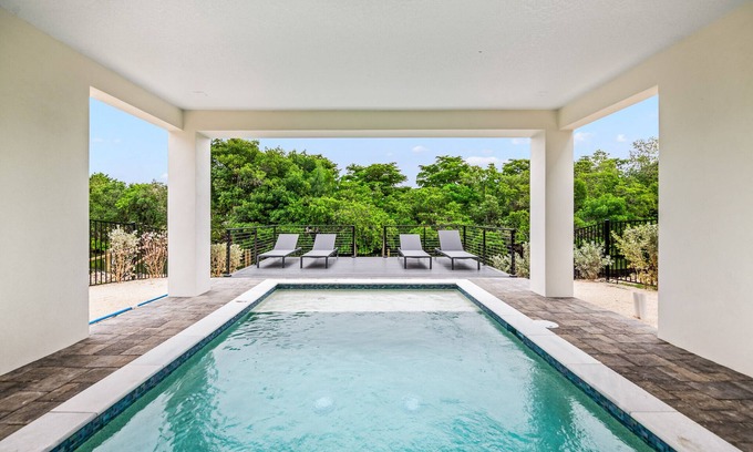 Cortez Casa | Eco-Luxury Canalfront Home with Pool and Dock near Anna Maria Island