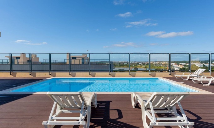 Olhao Apartamento | Elegant 2 BDR Flat W/ Rooftop Pool by LovelyStay