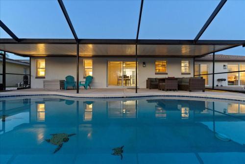 Palm Harbor Casa | Elegant Canal Front Oasis w Pool Near Beaches